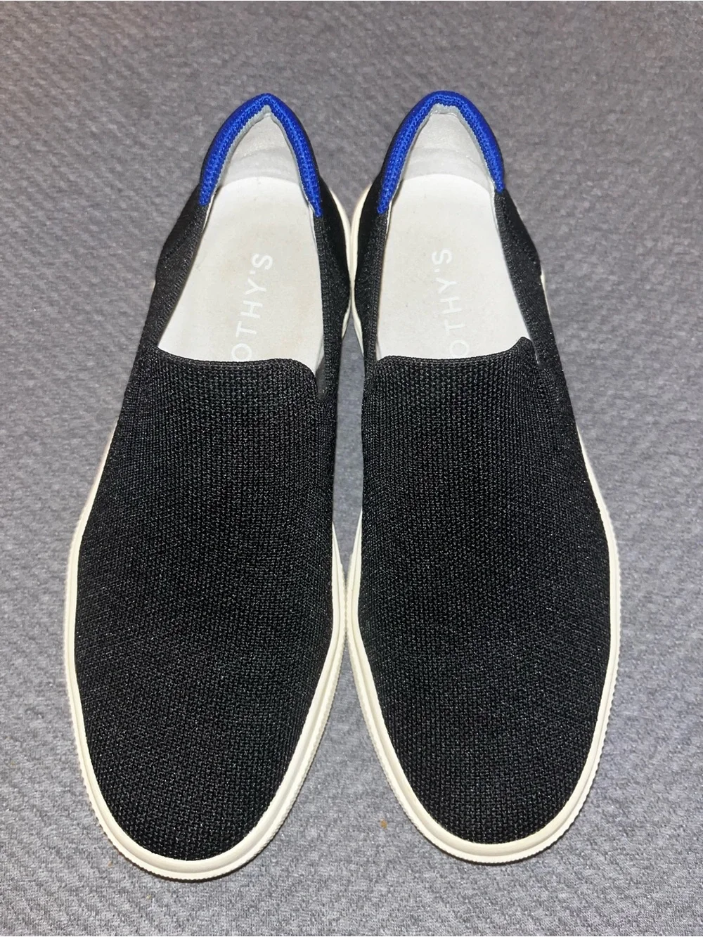 EUC Rothy's The Original Slip-On Sneakers in black. Size 9